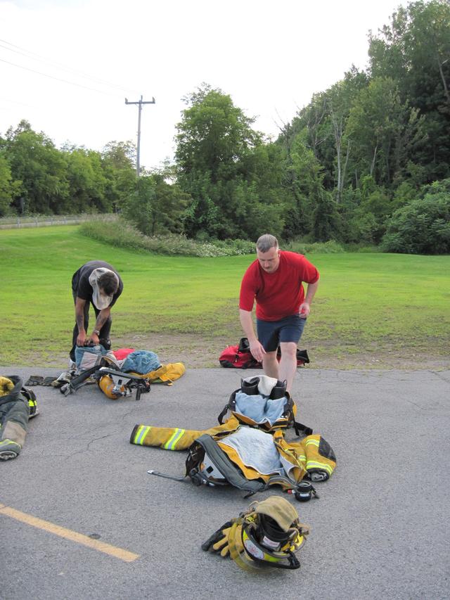 Jim Stinson begins donning drill 8/11/2010